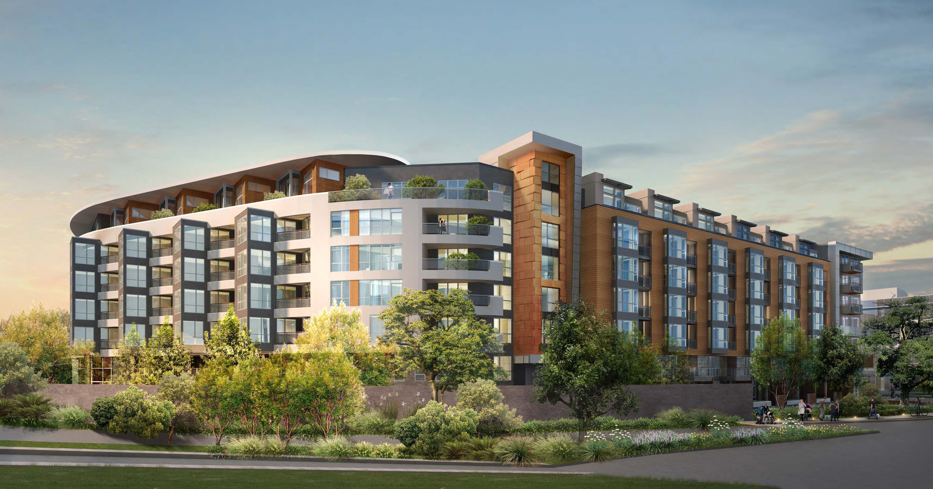 Shoreline Gateway dusk rendering showing curved residential building with landscaping