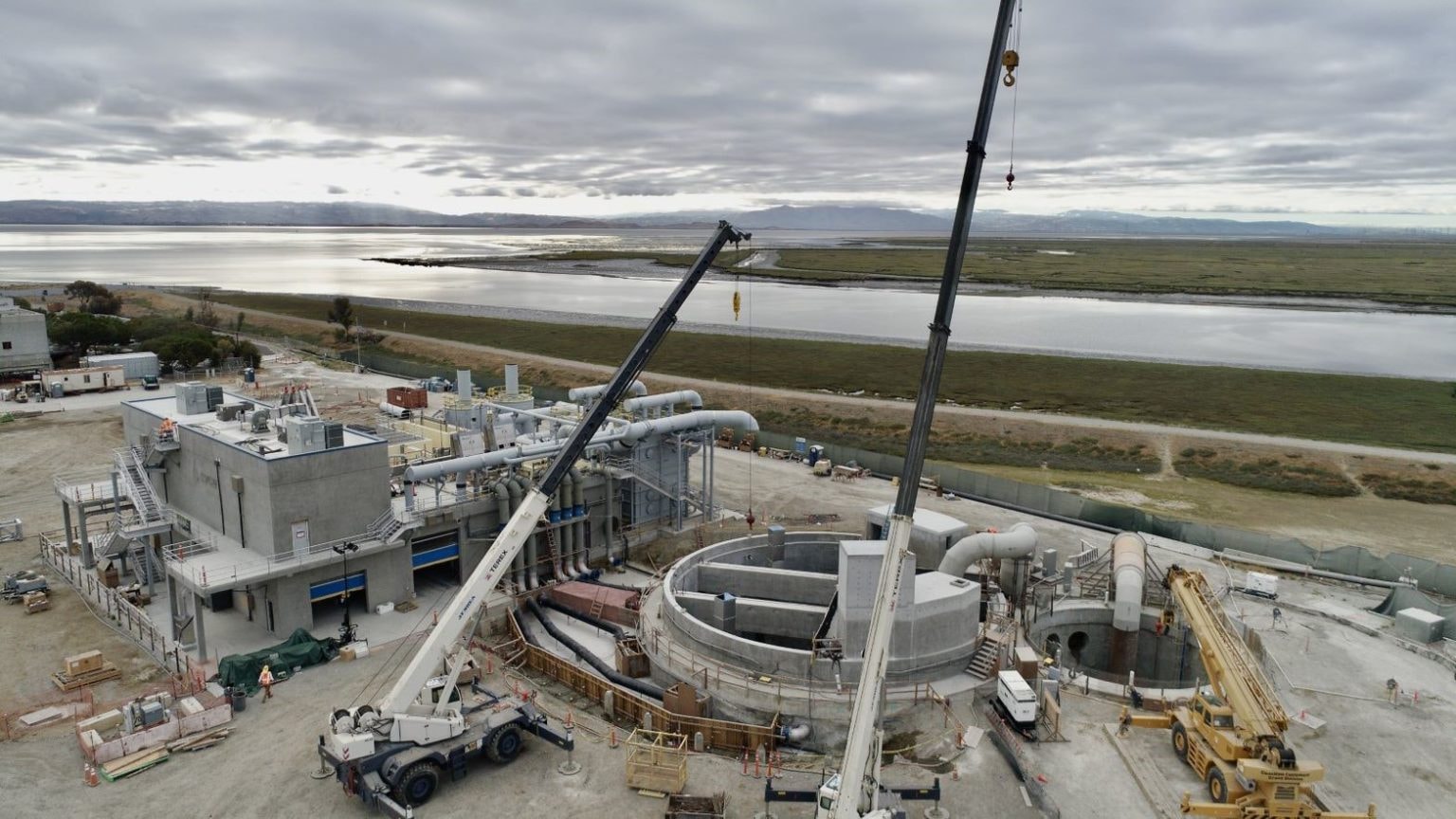 Aerial view of SVCW treatment plant construction with Bay wetlands backdrop